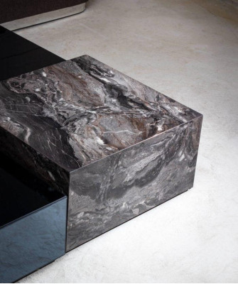 Stylish coffee table made of glass in a minimalist style for the living room