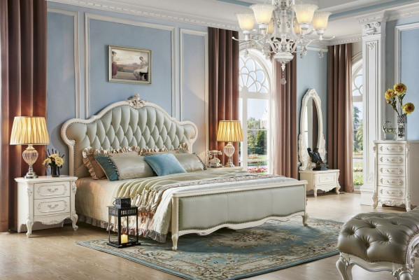 Elegant Chesterfield bed in classic style with matching bedside tables
