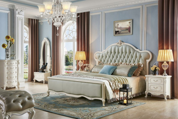 Elegant Chesterfield bed in classic style with matching bedside tables