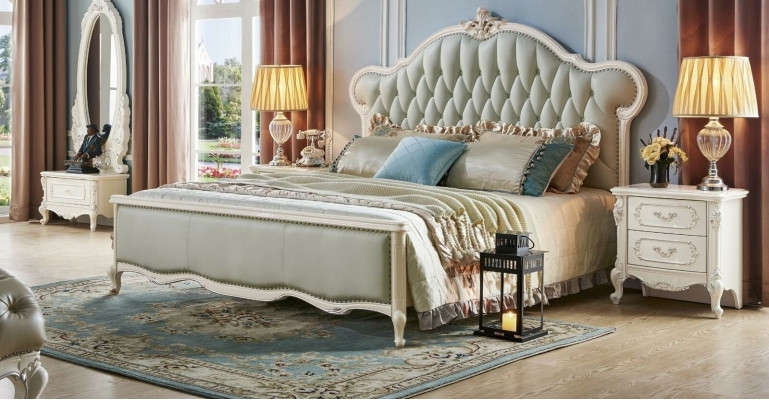 Elegant Chesterfield bed in classic style with matching bedside tables