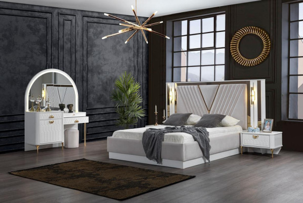 2-bedroom bed with gold trim and matching bedside tables