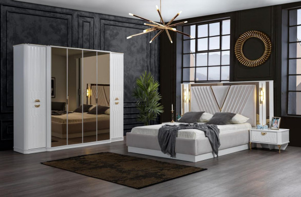 2-bedroom bed with gold trim and matching bedside tables