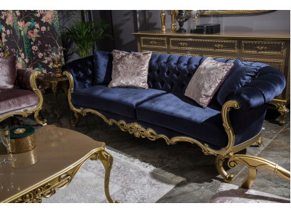 Chesterfield three-seater sofa in a luxurious blue color for the living room