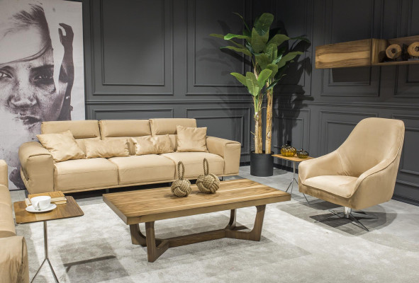 Luxurious Italian cream three-seater sofa with lush cushions