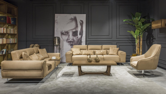 Luxurious Italian cream three-seater sofa with lush cushions