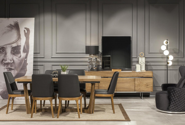 Elegant wooden table with chic black chairs in a modern design