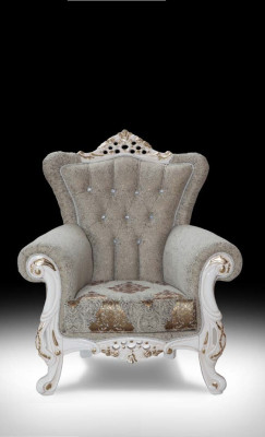 Beautiful armchair in classic style for the living room with shiny patterns
