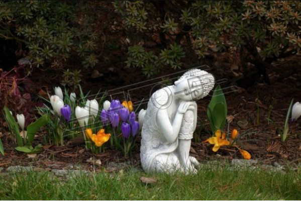 Decorative Buddha sculpture in stone effect. Large sculpture for garden figure
