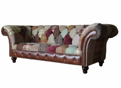 Colorful designer sofa in Chesterfield design with three seats