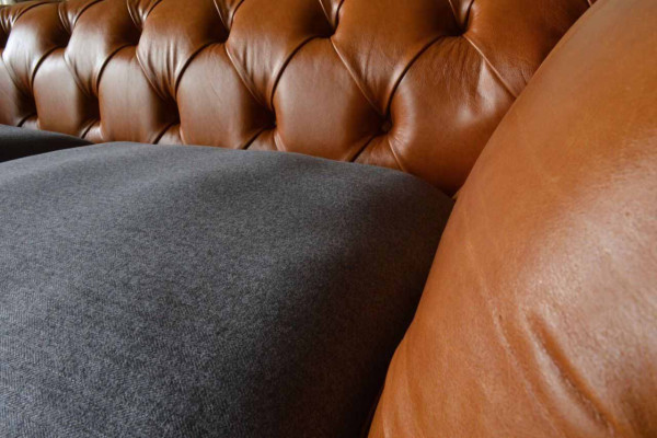Luxurious faux leather sofa in Chesterfield 3 Seater Sofa Design with three seats