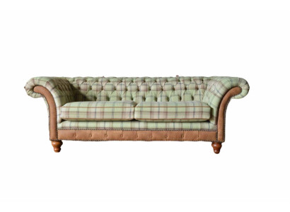 Luxurious designer sofa in Chesterfield design with three seats