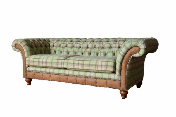 Luxurious designer sofa in Chesterfield design with three seats