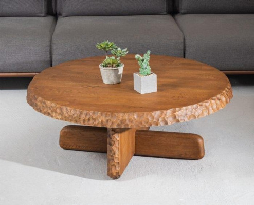 Luxurious round coffee table with wooden top in light brown color modern