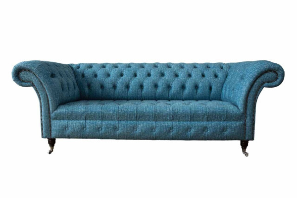 Blue three-seater velvet couch living room couches sofa seating furniture sofa Chesterfield