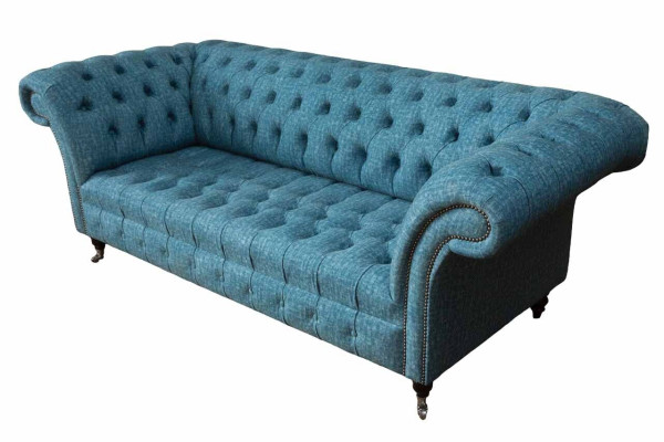 Blue three-seater velvet couch living room couches sofa seating furniture sofa Chesterfield