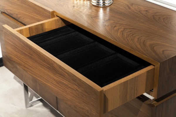 Modern stylish chest of drawers on steel legs for the living room