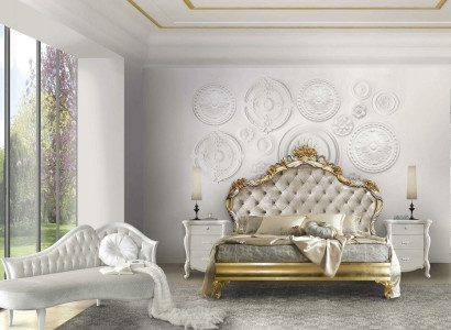 Beautiful bed in classic style with carved headboard