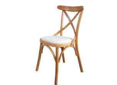 A wooden chair with a soft seat and a round back for your dining room