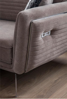 Luxurious, fashionable two-seater sofa with textile upholstery on high legs