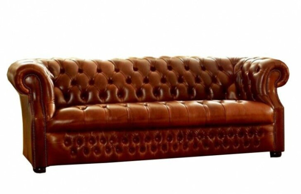 Brown Chesterfield three-seater designer 3-seater sofa. Stylish couch