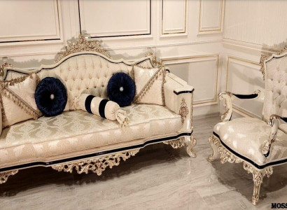 A luxurious Classic r Armchair in a beige color from Chesterfield