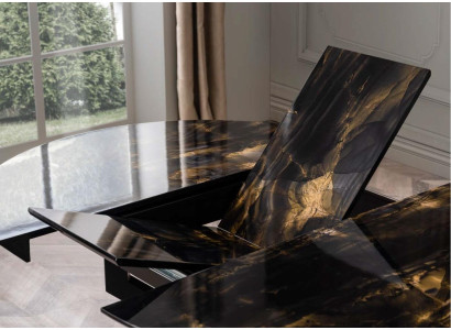 Round Dining table dark design coloring is made of wood. New model for the dining room