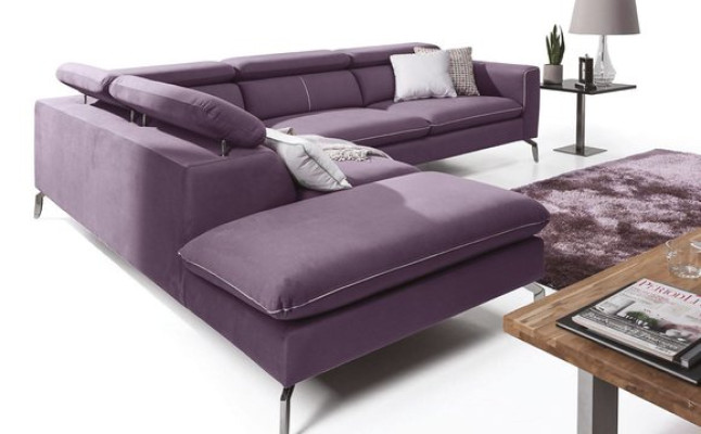 A functional, stylish corner sofa in a modern style for your home in purple luxury upholstery